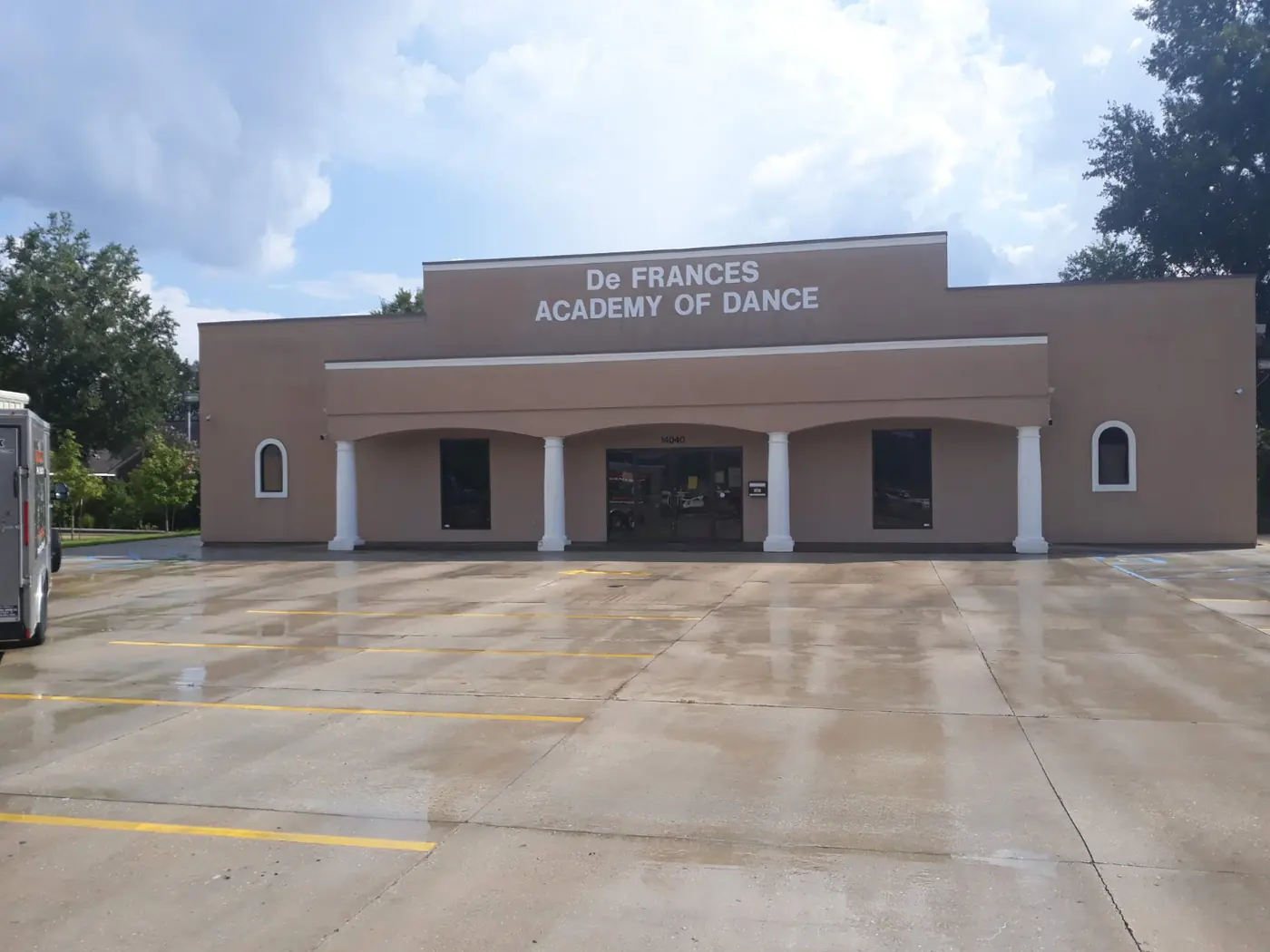 The De Frances Academy of Dance parking lot after cleaning and re-striping, clean and bright.